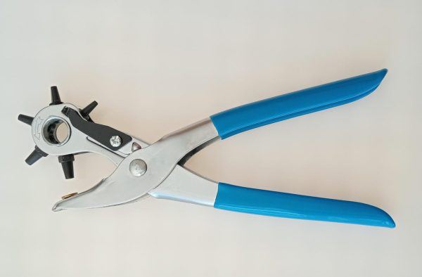 Rotary hand punch